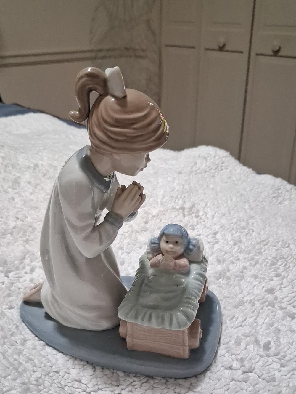 Nao By Lladro Porcelain Praying Girl Figurine with Blue Cradle Accent